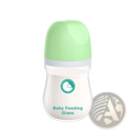 A clear glass anti-flatulence baby feeding bottle with a light green cap and white baby feeding glass text label