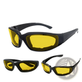 Black-framed anti-glare motorcycle riding glasses with vibrant yellow lenses designed for enhanced low-light visibility