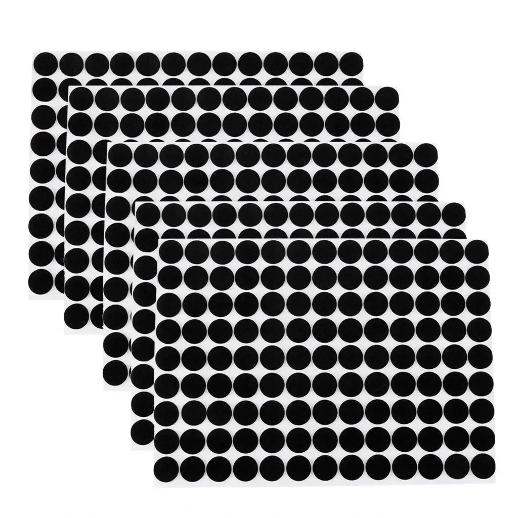 Black circular adhesive rubber furniture pads on white sheets for anti scratch protection 5 sheets pack