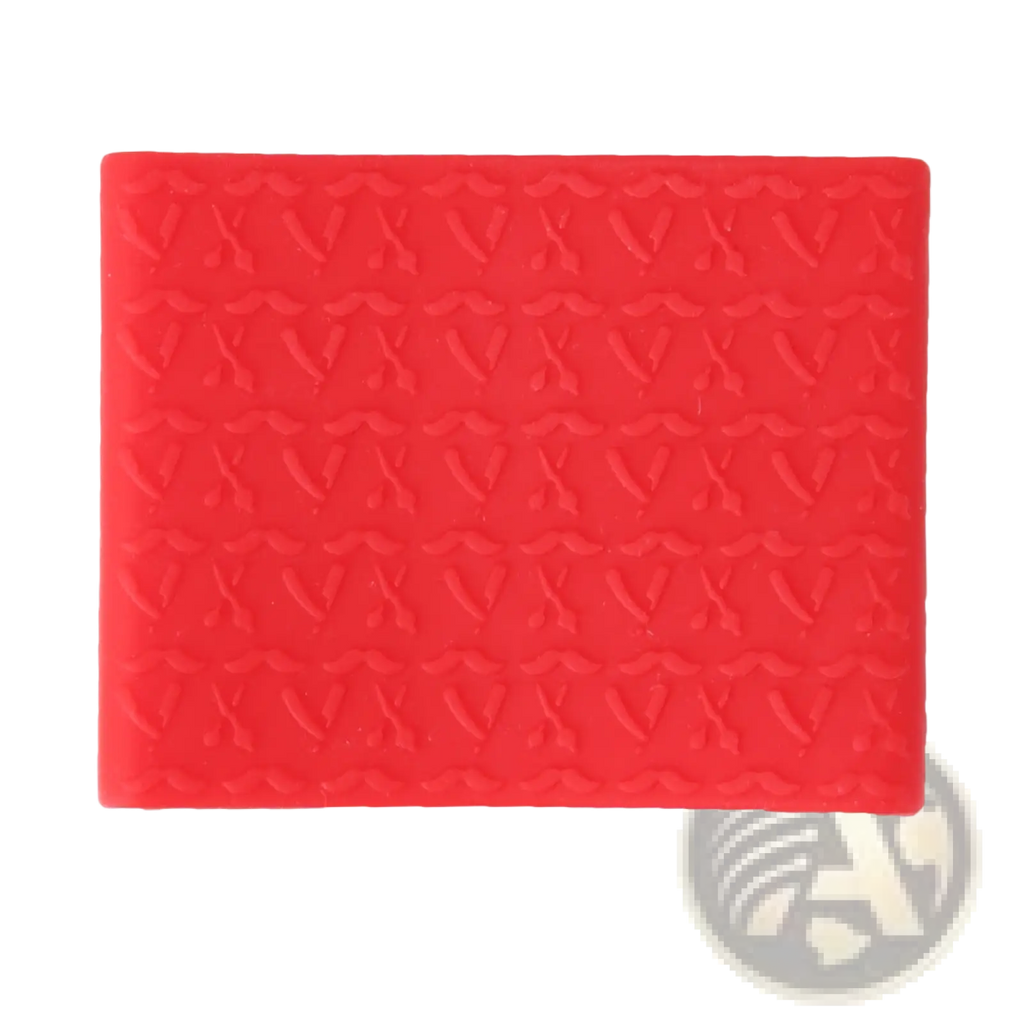 Red anti-slip silicone hair clipper grip ring with embossed pattern for secure handling in grooming