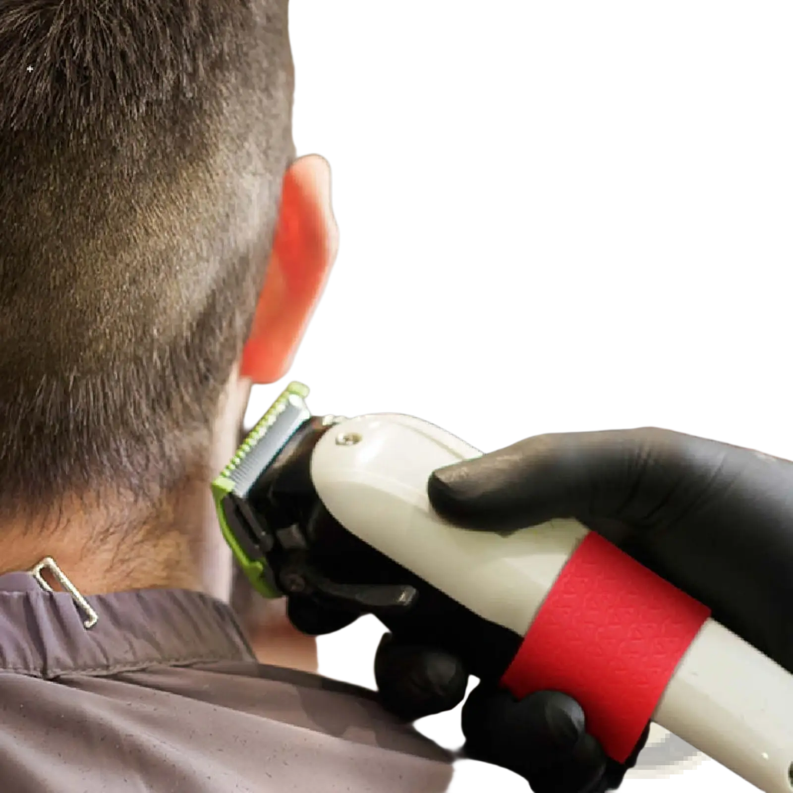 White and green electric hair clipper with red anti-slip silicone grip ring for secure handling, shown from the back side