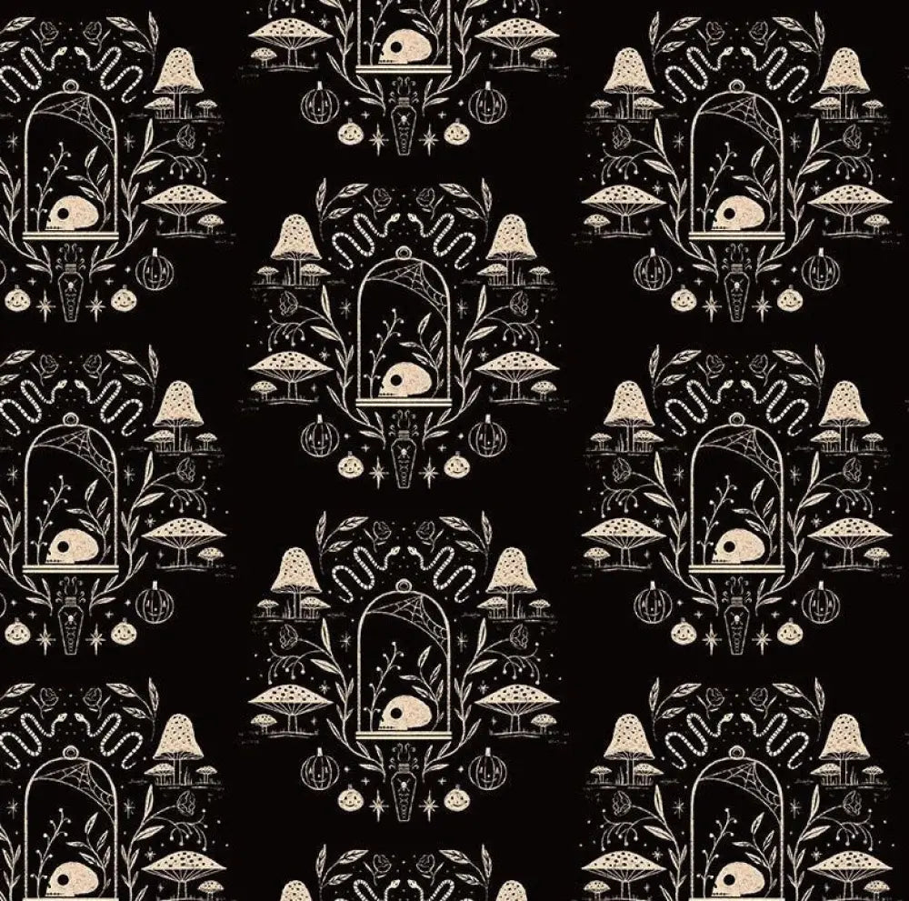 Black apothecary skater dress with white mushroom and skull print on fabric featuring botanical line art