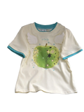 Cream-colored cotton round neck t-shirt with teal trim featuring an apple print with stars and white angel wings