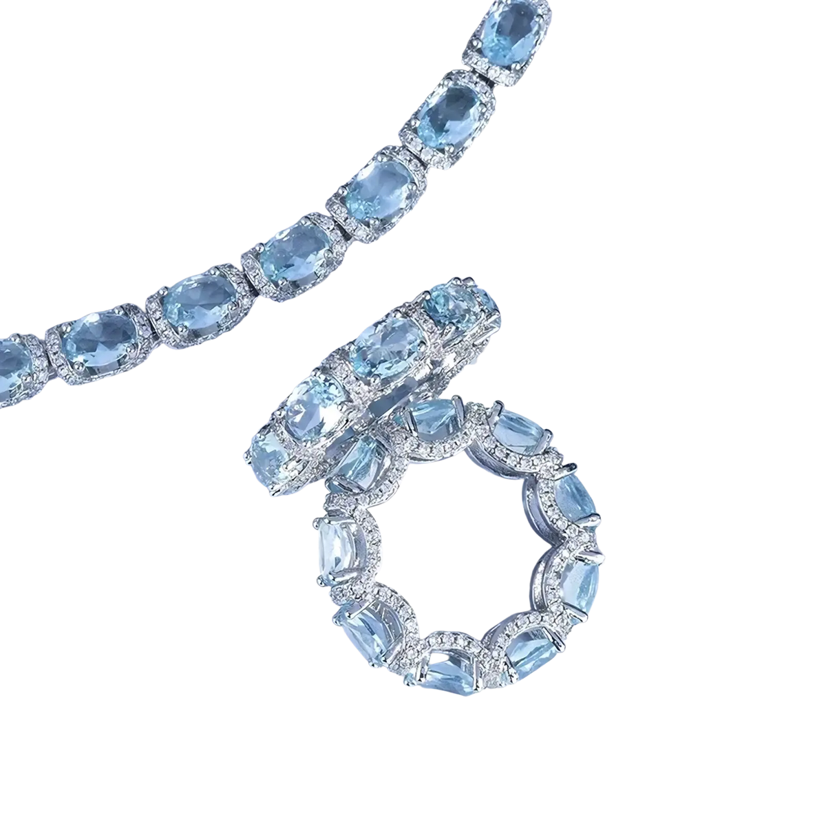 Elegant aquamarine crystal bridal jewelry set with oval-cut stones in silver-toned metal featuring bracelet and ring