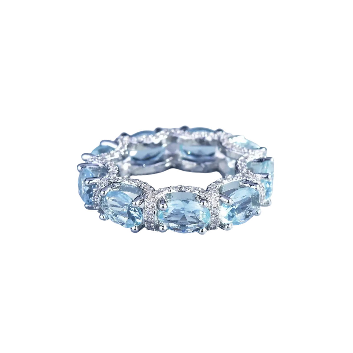 Elegant silver band ring with oval-cut sky blue topaz and sparkling diamonds from aquamarine crystal bridal jewelry set