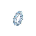 Elegant silver band ring with oval-cut sky blue topaz stones and pavé diamonds in aquamarine crystal bridal set