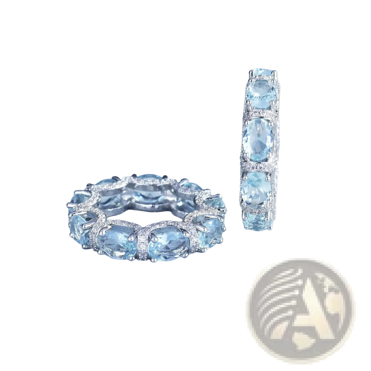 Elegant silver band ring and matching hoop earrings with oval-cut aquamarine crystals and diamond accents bridal set