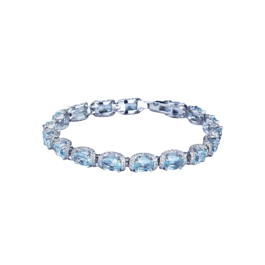Elegant silver bracelet from Aquamarine Crystal Bridal Jewelry Set with oval-cut sky blue gemstones and diamonds