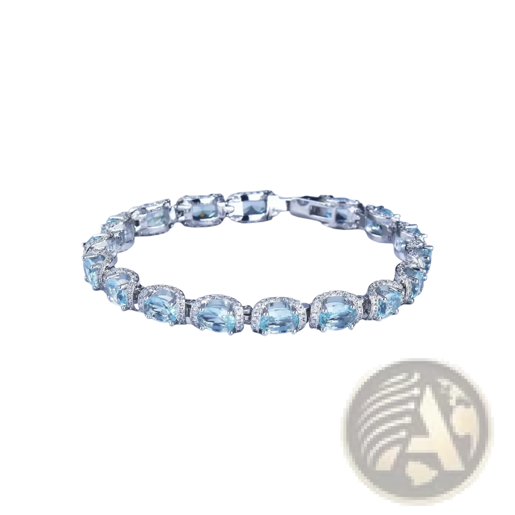 Elegant silver aquamarine crystal bridal bracelet with oval-cut sky blue gemstones and sparkling diamonds