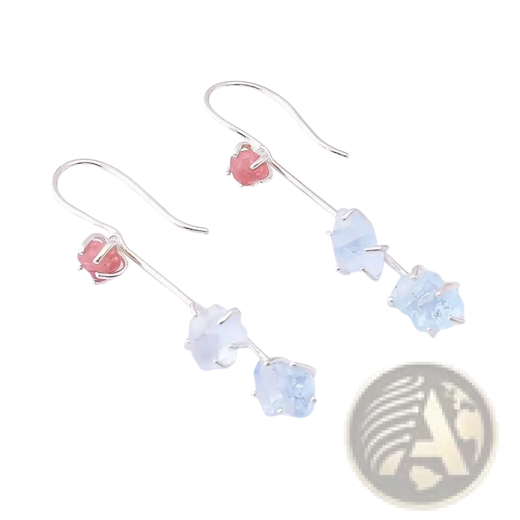 Silver hook aquamarine spinel drop earrings with a pink gemstone top and two light blue faceted stones below