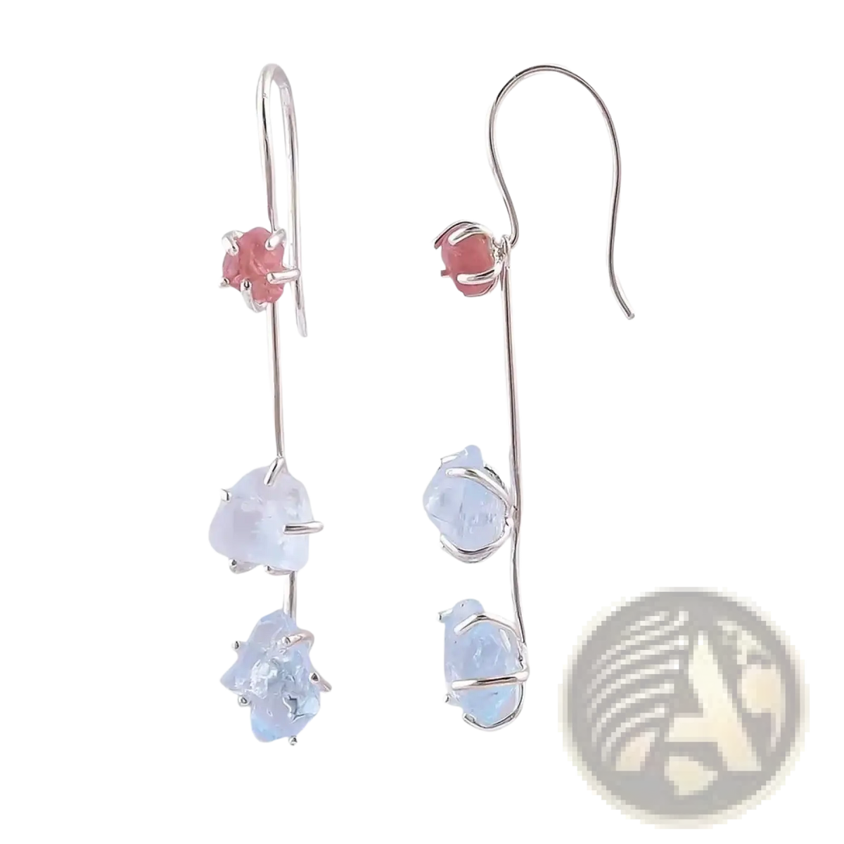 Silver drop earrings featuring a pink spinel gemstone and two light blue raw aquamarine stones below