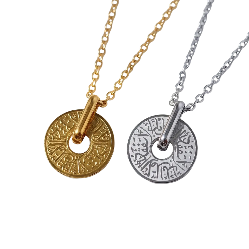 Two circular arabic calligraphy pendant necklaces in gold and silver stainless steel with intricate engraved design