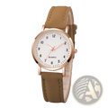 A delicate rose gold women leather quartz watch with an arabic dial, white face, and tan leather strap