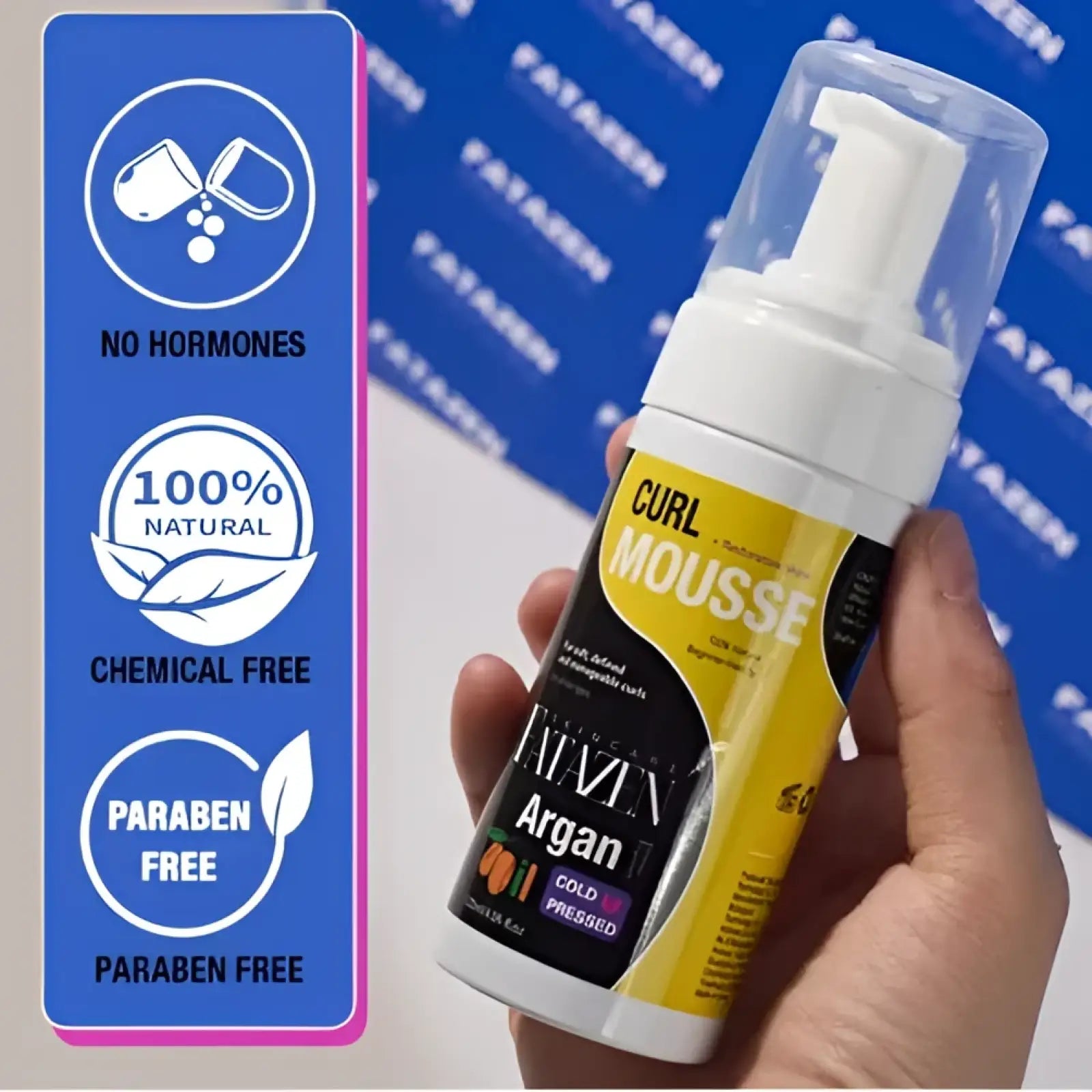 Yellow and black bottle of fitazen argan oil curl mousse with white pump dispenser for strong hold hair styling foam