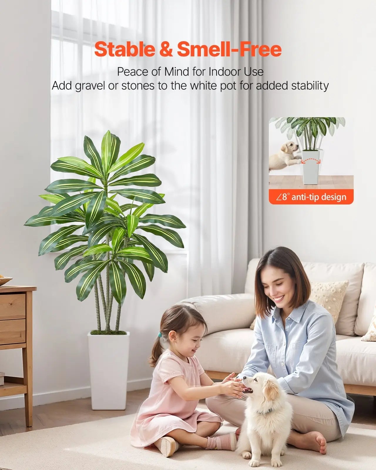 Artificial dracaena tree with tall glossy green leaves in a white planter standing five feet tall
