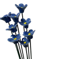 A cluster of artificial flowers blue ceramic forget me nots with bright yellow centers for decorating vases