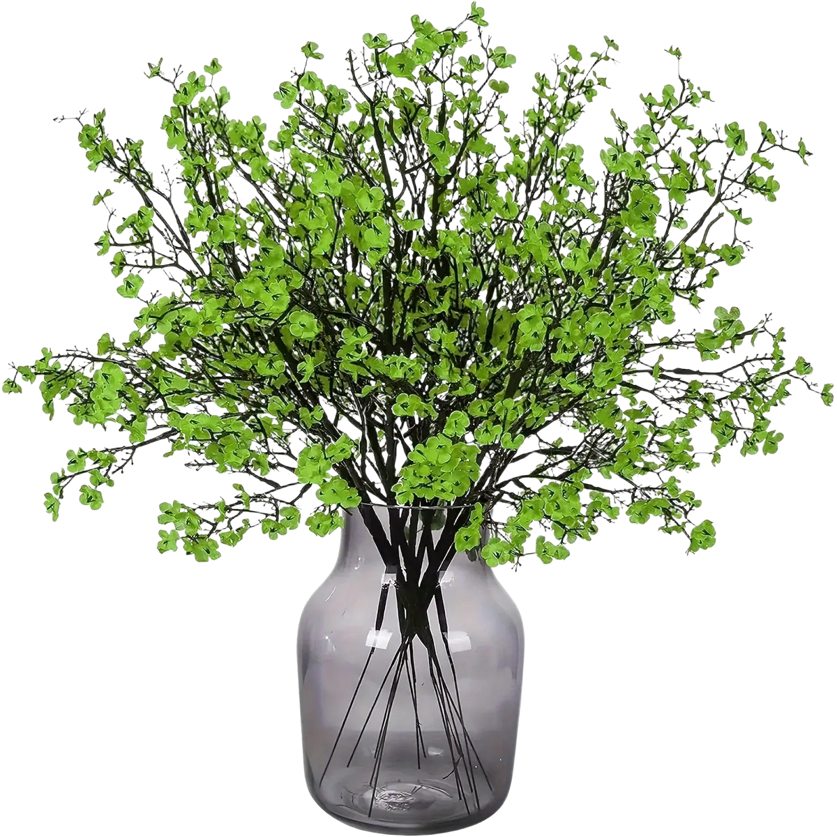 A lush arrangement of artificial flowers cherry blossoms in pink displayed in a sleek translucent gray glass vase