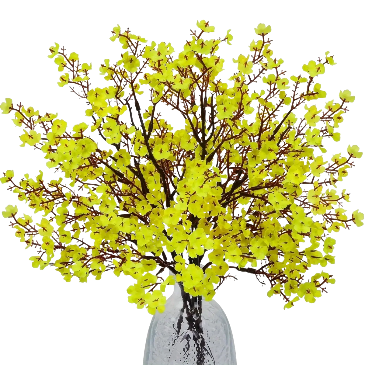A vibrant yellow artificial flowers cherry branch with brown stems in a clear glass vase for decoration
