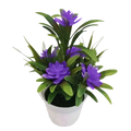 Purple artificial flowers arranged in a white plastic pot for home decor potted plant display