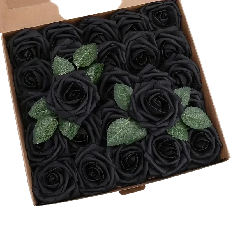 Black artificial flowers roses with stems and green leaves arranged in a decorative box for home decor