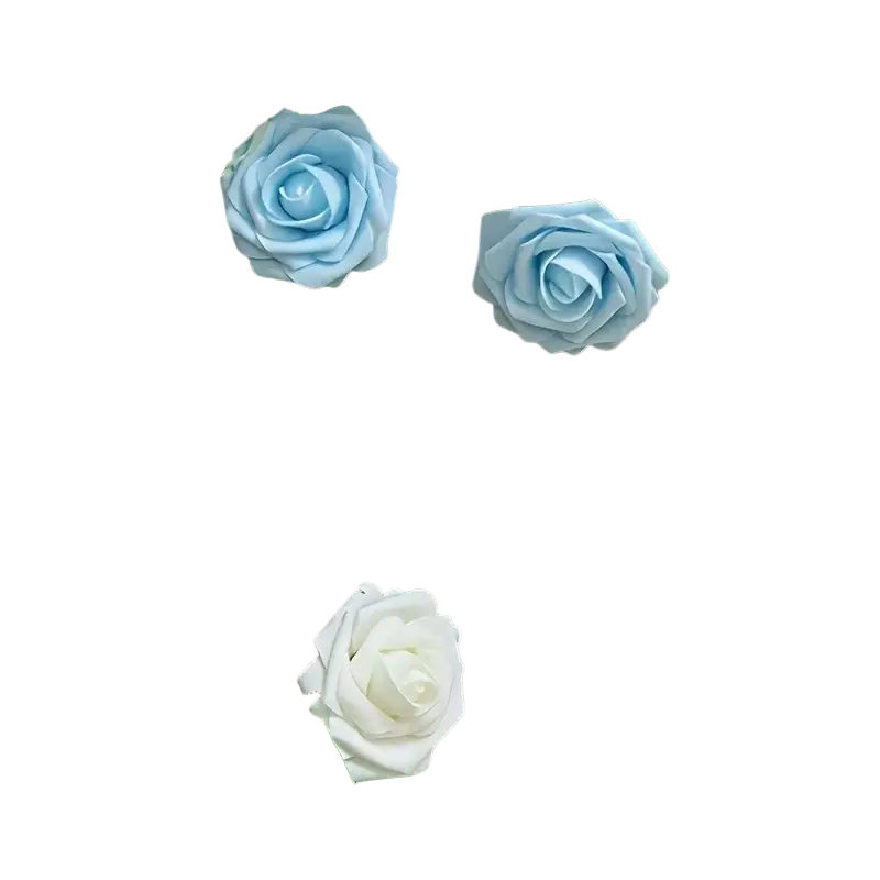 Artificial flowers featuring light blue and white foam roses with green leaves for decorative use