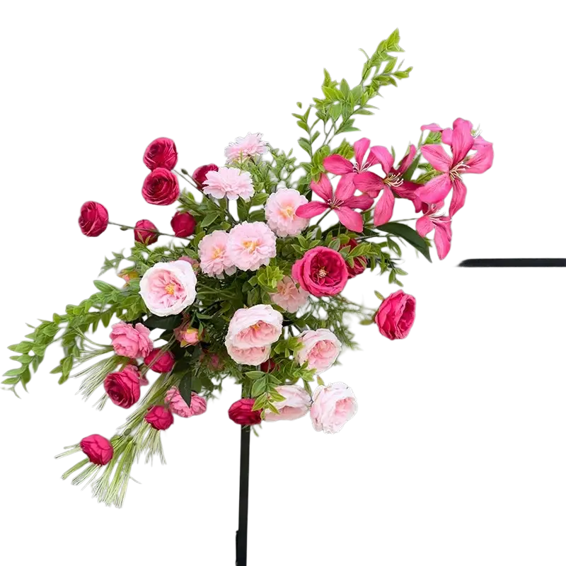 A vibrant artificial flowers wedding arch floral backdrop with pink and deep red roses and white blossoms