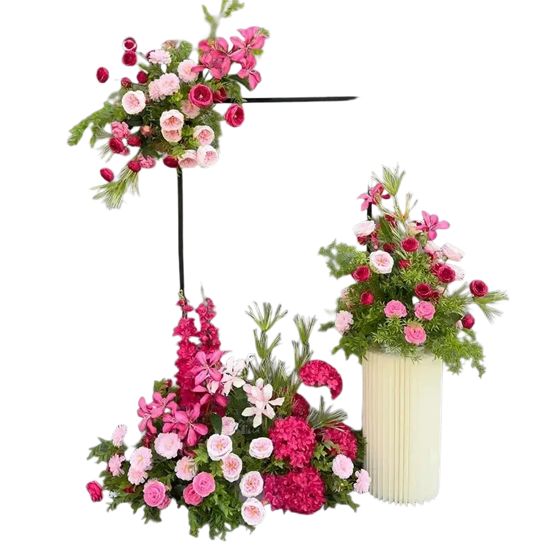 A vibrant artificial flowers wedding arch floral backdrop with pink magenta and white roses on black metal frame