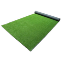 Green artificial grass mat indoor outdoor green turf carpet measuring 50cm by 100cm with realistic texture