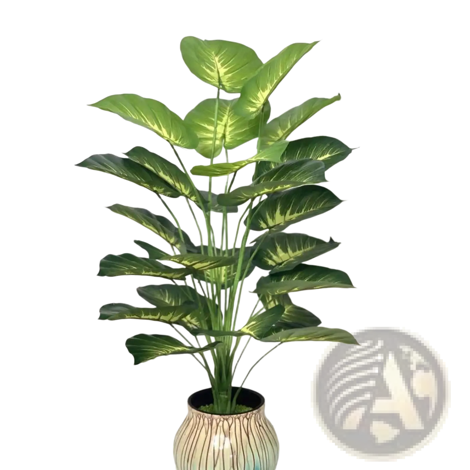 Artificial monstera turtle leaf potted plant with tall lush dieffenbachia leaves and ceramic pot with brown stripes and teal accents