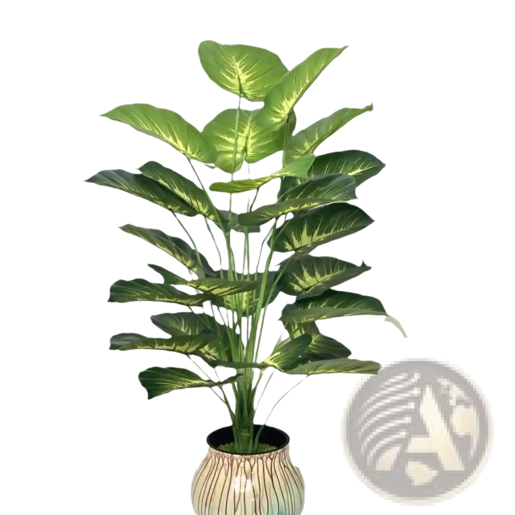 Artificial monstera turtle leaf potted plant with broad green veined leaves in a striped ceramic pot for garden decor