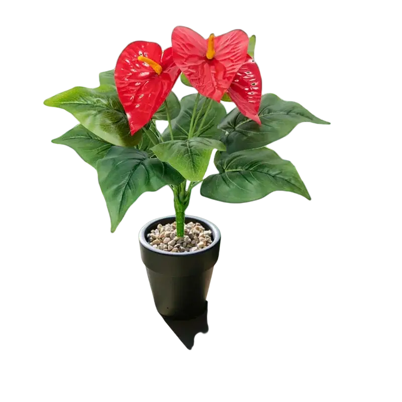 Artificial red anthurium potted plant with vibrant red flowers and glossy green leaves in a black ceramic pot