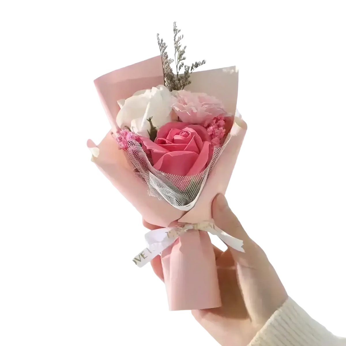 Artificial rose flower bouquet with pink and white soap roses wrapped in blush paper and sheer mesh for gifts