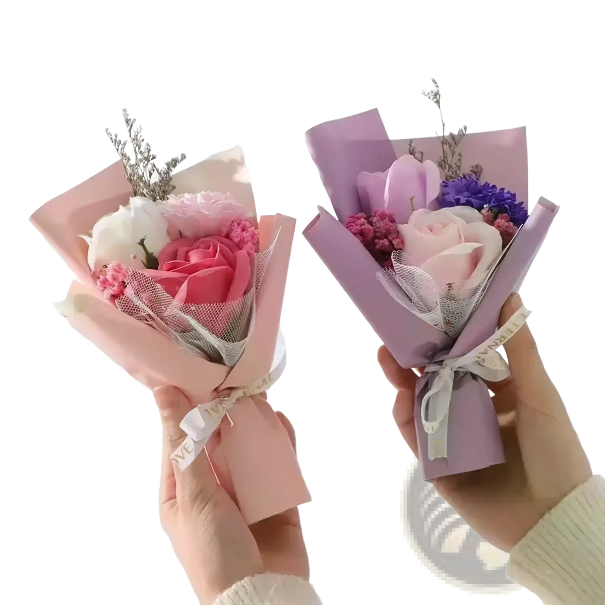 Artificial rose flower bouquet with pink and lavender soap flowers wrapped in matching paper with delicate mesh accents