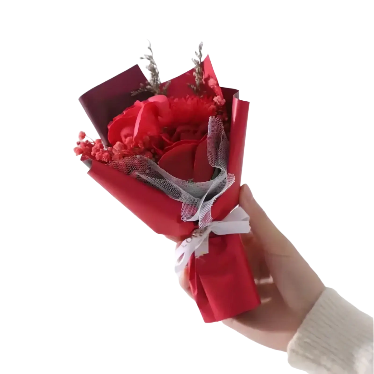 Artificial rose flower bouquet featuring vibrant red roses wrapped in matching paper tied with a white ribbon