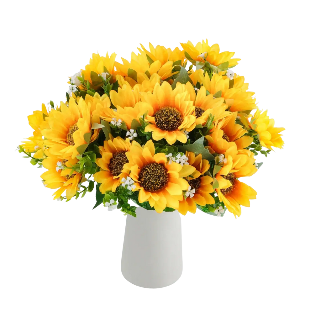 A vibrant artificial sunflower bouquet with bright yellow petals and white flowers in a white ceramic vase