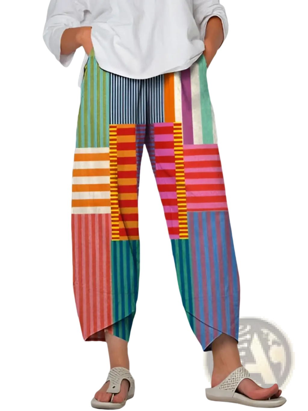 Artistic printed and embroidered slimming cropped pants featuring colorful patchwork wide-leg vertical stripes in green orange pink and blue