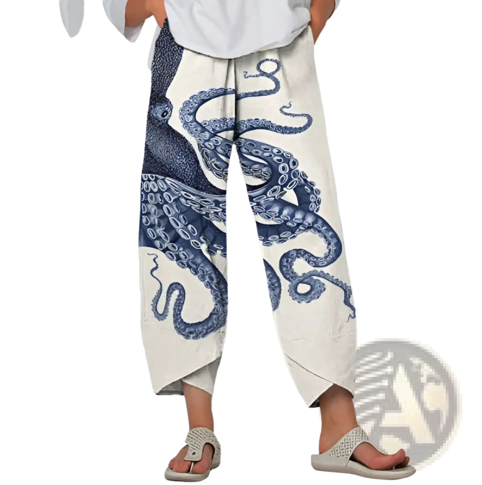 Cream-colored cotton slimming cropped pants with bold blue octopus print featuring detailed tentacles and eyes