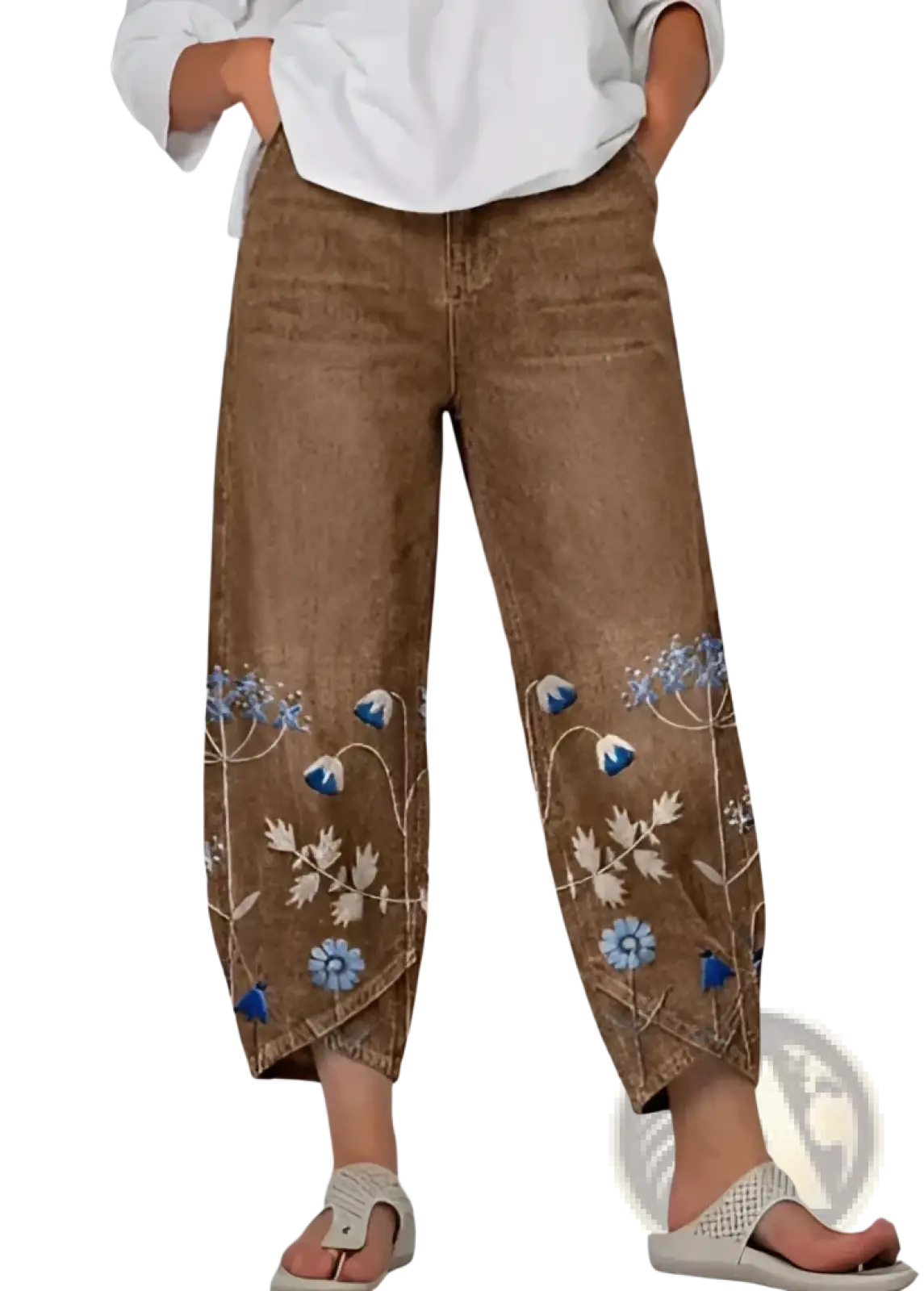 Brown denim slimming cropped pants with delicate blue and white floral embroidery along the lower legs