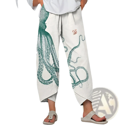 White cotton slimming cropped pants with large green octopus print and small red embroidered patch on thigh