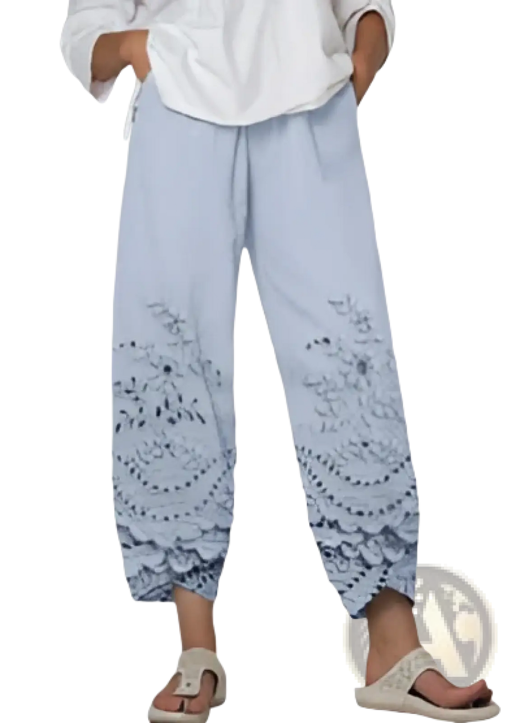 Light blue wide-leg embroidered pants with delicate lace hem from artistic printed and embroidered slimming cropped pants collection