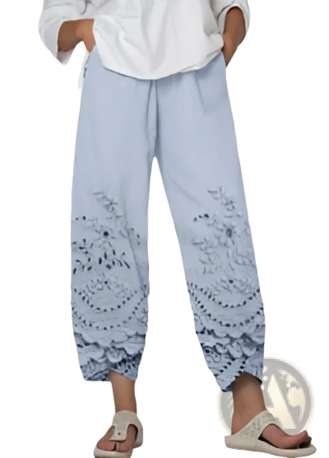 Light blue wide-leg embroidered pants with delicate lace hem from artistic printed and embroidered slimming cropped pants collection