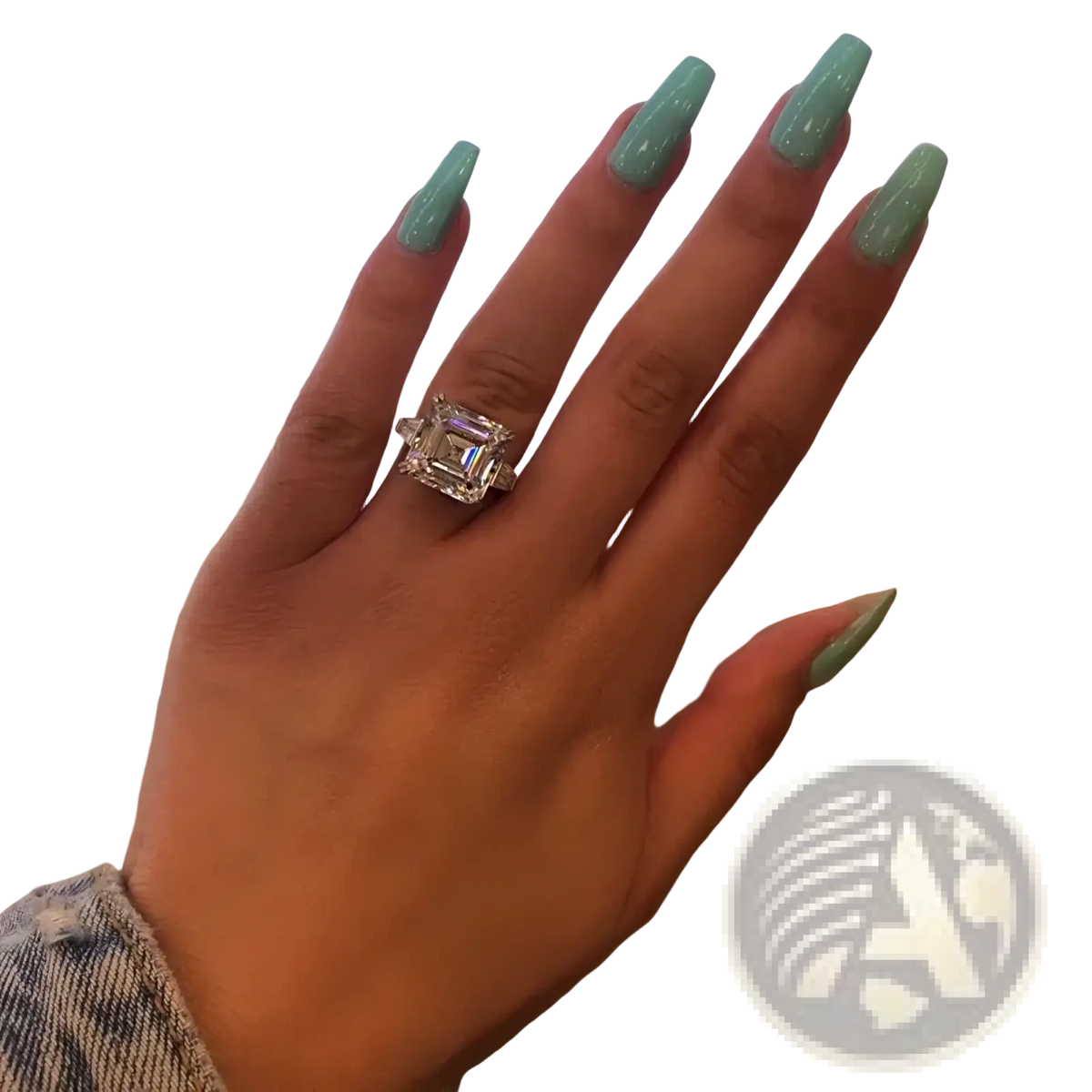 Asscher cut lab diamond sterling silver promise ring with a sparkling emerald-cut diamond on a finger with mint green nails