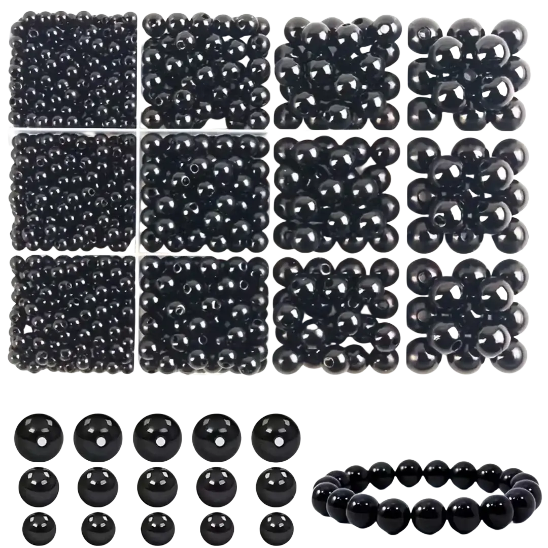 Assorted round black glass bead set in various sizes neatly arranged with a matching bracelet for diy jewelry making
