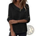 Black asymmetric button blouse with v-neckline and three-quarter sleeves featuring gold button accents