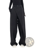 Black asymmetric wide leg trousers featuring sleek modern design and subtle asymmetrical front paneling