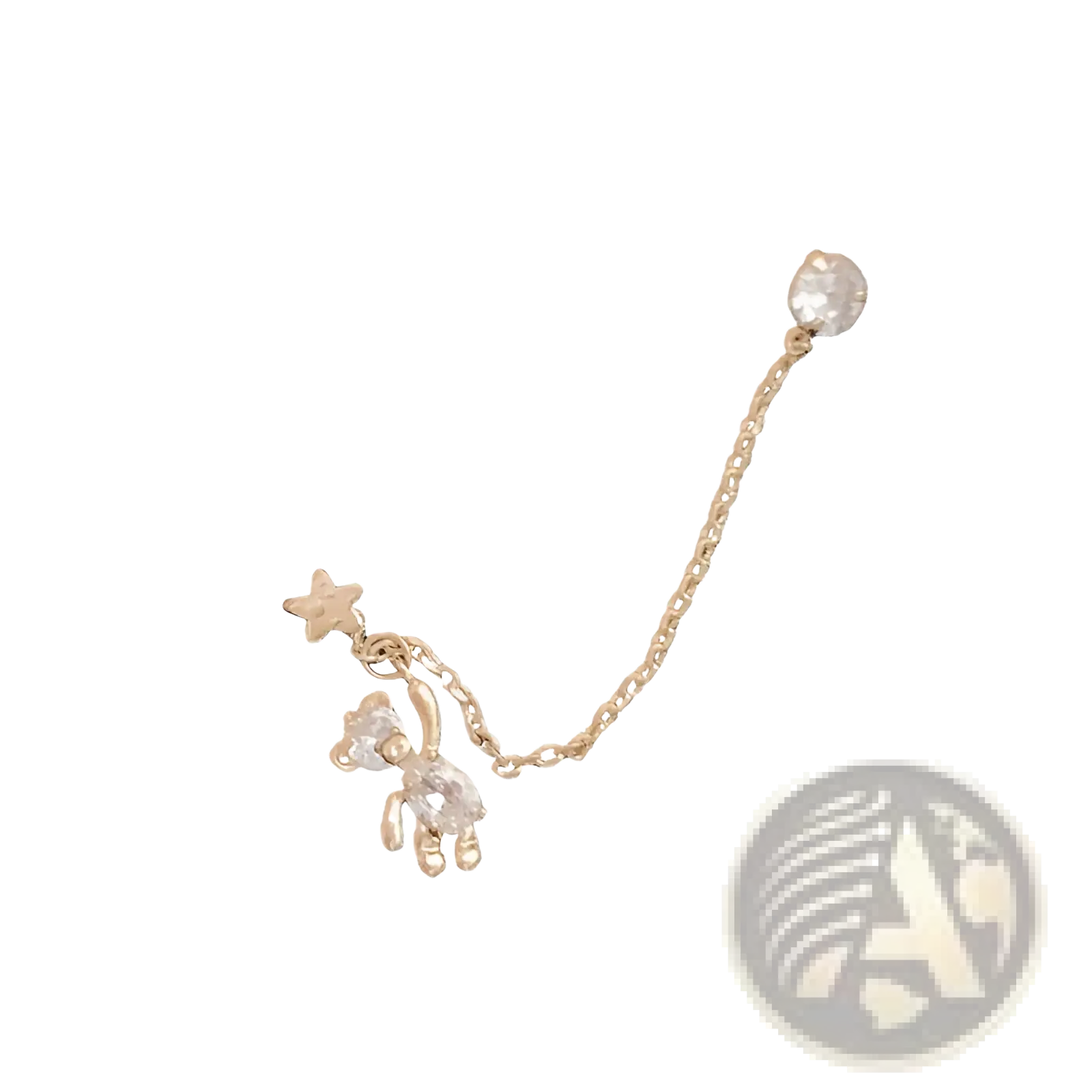 Gold-toned asymmetrical ear cuff with rhinestone teddy bear charm, star accent, and adjustable chain connected to crystal stud