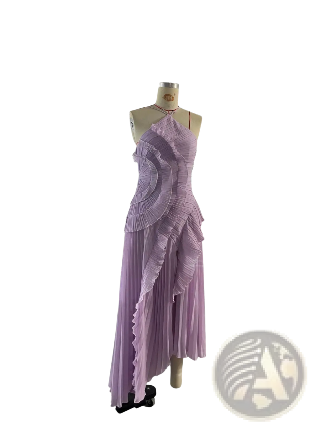 Lavender pleated asymmetrical chiffon dress with halter neckline displayed on mannequin for evening wear