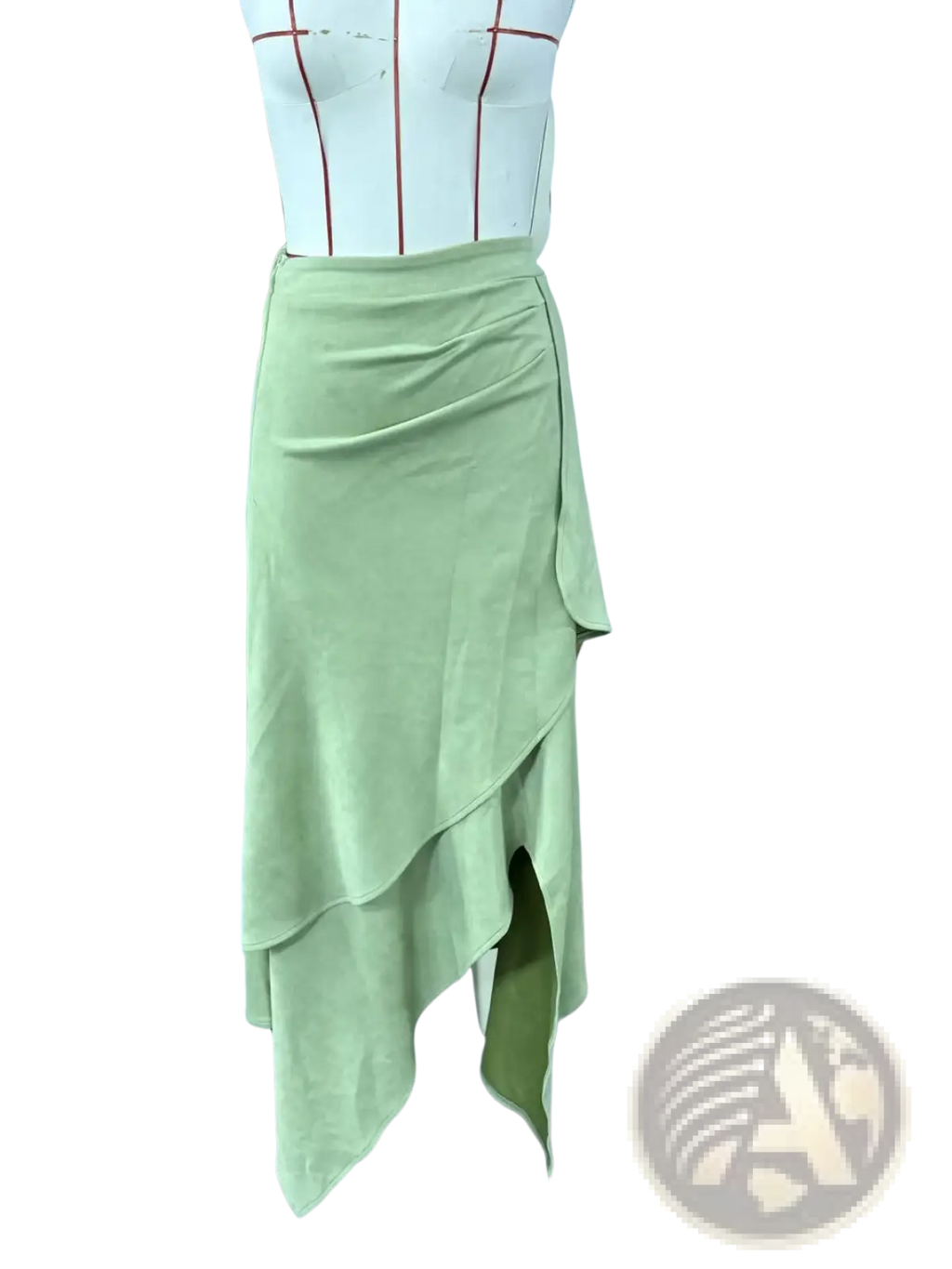 A soft sage green asymmetrical ruffled skirt with layered suede and velvet draped wrap design