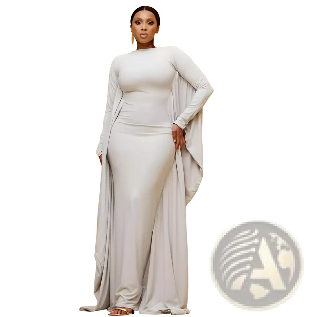 A sleek light gray satin asymmetrical maxi dress with batwing long sleeves and a flowing cape-like overlay