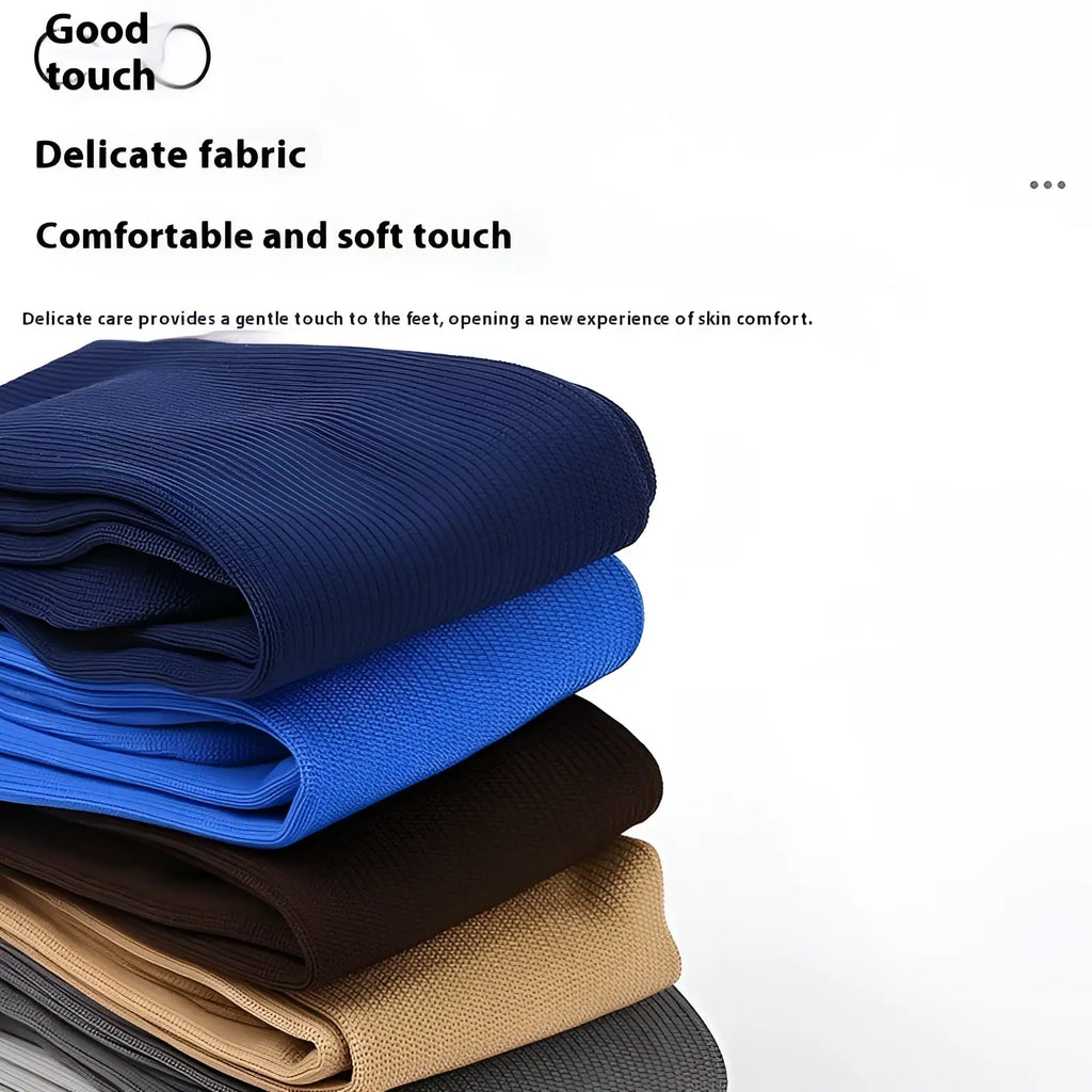 Stack of neatly folded ribbed knit athletic compression knee high socks in navy royal blue brown beige and gray colors